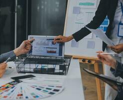 Close up ux developer and ui designer use augmented reality brainstorming about mobile app interface wireframe design on desk at modern office.Creative digital development agency photo