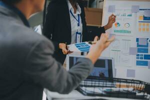 Close up ux developer and ui designer use augmented reality brainstorming about mobile app interface wireframe design on desk at modern office.Creative digital development agency photo