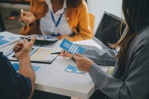 Close up ux developer and ui designer use augmented reality brainstorming about mobile app interface wireframe design on desk at modern office.Creative digital development agency photo