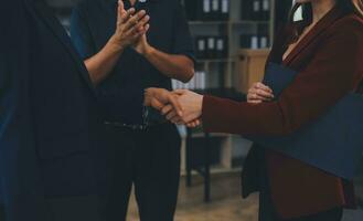 Business handshake for teamwork of business merger and acquisition,successful negotiate,hand shake,two businessman shake hand with partner to celebration partnership and business deal concept photo