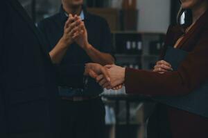 Business handshake for teamwork of business merger and acquisition,successful negotiate,hand shake,two businessman shake hand with partner to celebration partnership and business deal concept photo