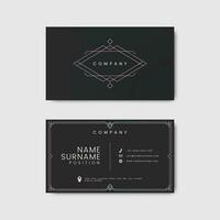 a black and pink business card with a geometric design vector