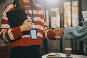 Meeting and greeting concept, Two confident Business handshake and business people after discussing good deal of Trading contract and new projects for both companies, success, partnership, co worker. photo