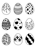 Easter eggs decorated with ornaments and flowers. Black and white images of Easter eggs. Doodle style vector