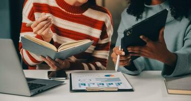 Finance manager meeting discussing company growth project success financial statistics, professional investor working start up project for strategy plan with document, laptop and digital tablet. photo