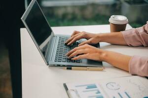 Finance manager meeting discussing company growth project success financial statistics, professional investor working start up project for strategy plan with document, laptop and digital tablet. photo