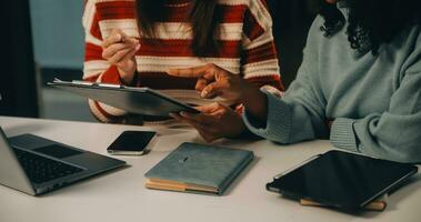 Finance manager meeting discussing company growth project success financial statistics, professional investor working start up project for strategy plan with document, laptop and digital tablet. photo
