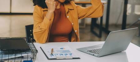 Finance manager meeting discussing company growth project success financial statistics, professional investor working start up project for strategy plan with document, laptop and digital tablet. photo