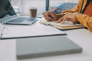 Finance manager meeting discussing company growth project success financial statistics, professional investor working start up project for strategy plan with document, laptop and digital tablet. photo