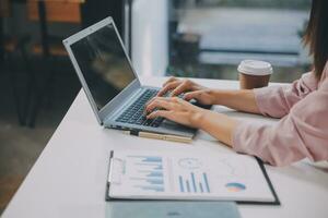 Finance manager meeting discussing company growth project success financial statistics, professional investor working start up project for strategy plan with document, laptop and digital tablet. photo