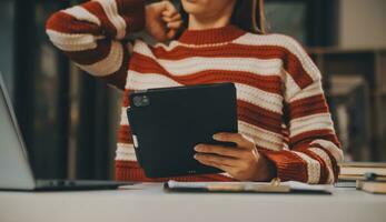 Finance manager meeting discussing company growth project success financial statistics, professional investor working start up project for strategy plan with document, laptop and digital tablet. photo