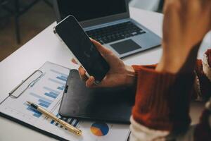 Finance manager meeting discussing company growth project success financial statistics, professional investor working start up project for strategy plan with document, laptop and digital tablet. photo