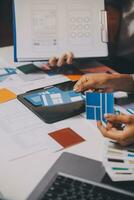 team of UI UX web designer are working together to develop mobile responsive websites. Mobile Mockup photo