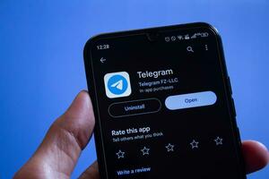 Afyonkarahisar, Turkey, December 20, 2023. Telegram Android app displayed on smartphone screen. Online messaging application. photo