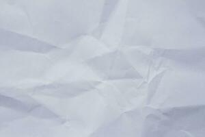 Wrinkled white paper texture or background photo