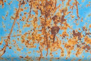 Rusty blue metal texture as background photo