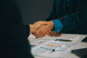 Business handshake for teamwork of business merger and acquisition,successful negotiate,hand shake,two businessman shake hand with partner to celebration partnership and business deal concept photo