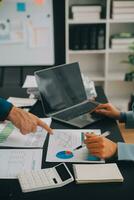 Financial Business team present. Business man hands hold documents with financial statistic stock photo, discussion, and analysis report data the charts and graphs. Finance Financial concept photo