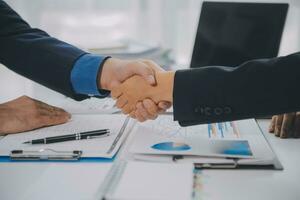 Business handshake for teamwork of business merger and acquisition,successful negotiate,hand shake,two businessman shake hand with partner to celebration partnership and business deal concept photo