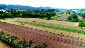 Tractor Working in the Agriculture Field Aerial View video