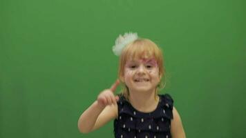 Happy three years old girl. Cute child. Dancing and make faces. Chroma Key video