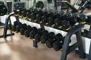 Dumbbells in a fitness center photo