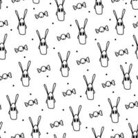 Seamless pattern with doodle rabbits and candy in black and white colors. Vector illustration.