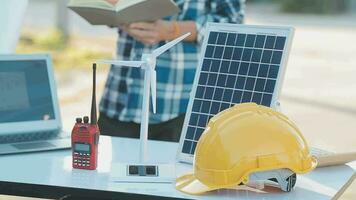 A team of construction engineers talks to managers and construction workers at the construction site. Quality inspection, work plan, home and industrial building design project video