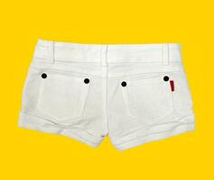 White short on yellow background photo