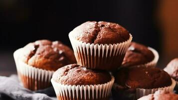 AI generated Chocolate cakes, muffins or cupcakes, baked in a bakery holiday sweet food recipe idea, generative ai photo