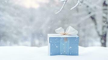 AI generated Christmas holiday gift and present, gift box in the snow in snowfall winter countryside nature for boxing day, holidays shopping sale photo