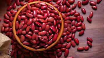 AI generated Raw Red kidney beans in a wooden bowl on a wooden table, top view. Ideal for food and cooking related content. For banner, poster, advertising, web design, organic food store photo