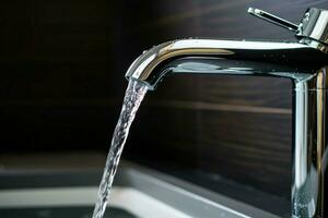 AI generated Flowing elegance a faucet up close, with water in motion photo