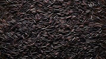 AI generated Close-up of black rice grains scattered on white background, top view. Black rice texture. Suitable for food and nutrition related content. Ideal for use in culinary photo