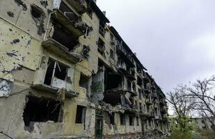 destroyed and burned houses in the city Russia Ukraine war photo