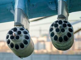 army military rocket launcher on the wing of an airplane photo