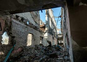 destroyed and burned houses in the city Russia Ukraine war photo