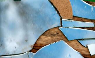 shards of a broken mirror close up photo