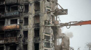 destroyed and burned houses in the city Russia Ukraine war photo