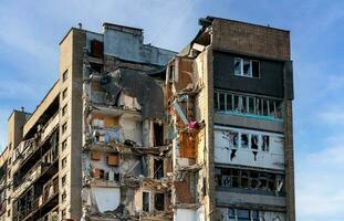 destroyed and burned houses in the city Russia Ukraine war photo