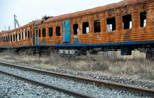 burned out blown up wagons in Ukraine photo