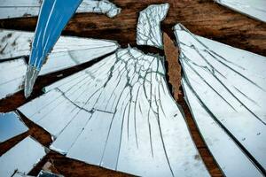 shards of a broken mirror close up photo