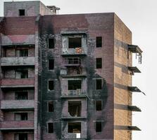 destroyed and burned houses in the city Russia Ukraine war photo