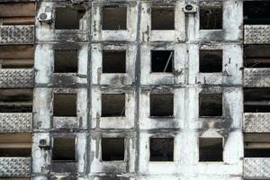 destroyed and burned houses in the city Russia Ukraine war photo