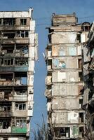 destroyed and burned houses in the city Russia Ukraine war photo