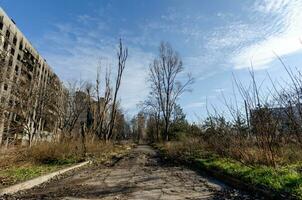 destroyed and burned houses in the city Russia Ukraine war photo