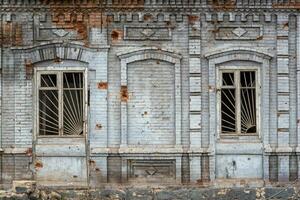 destroyed and burned houses in the city Russia Ukraine war photo