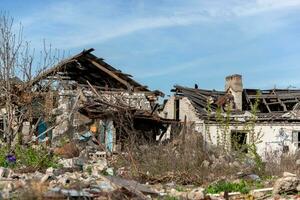 destroyed and burned houses in the city Russia Ukraine war photo