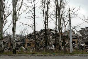 destroyed and burned houses in the city Russia Ukraine war photo