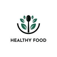 Healthy food logo design concept with spoon and leaf vector